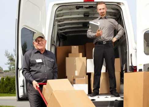 Removal team planning a house move in a Belgravia street