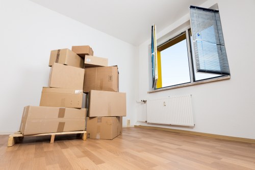 Local movers transporting office items through a Belgravia street with access considerations