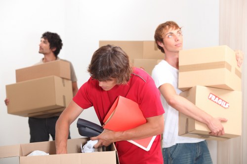 Moving crew handling access challenges in a Belgravia office building