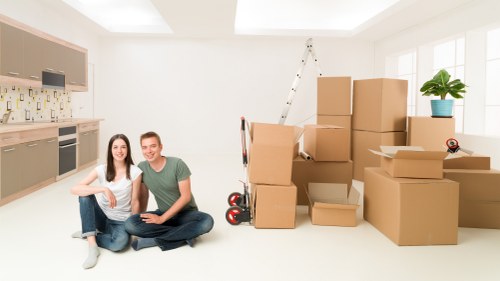 Packed moving boxes and furniture prepared for a Belgravia property relocation