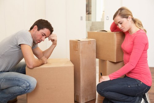 Local removals team loading furniture for a Belgravia flat move with narrow street access